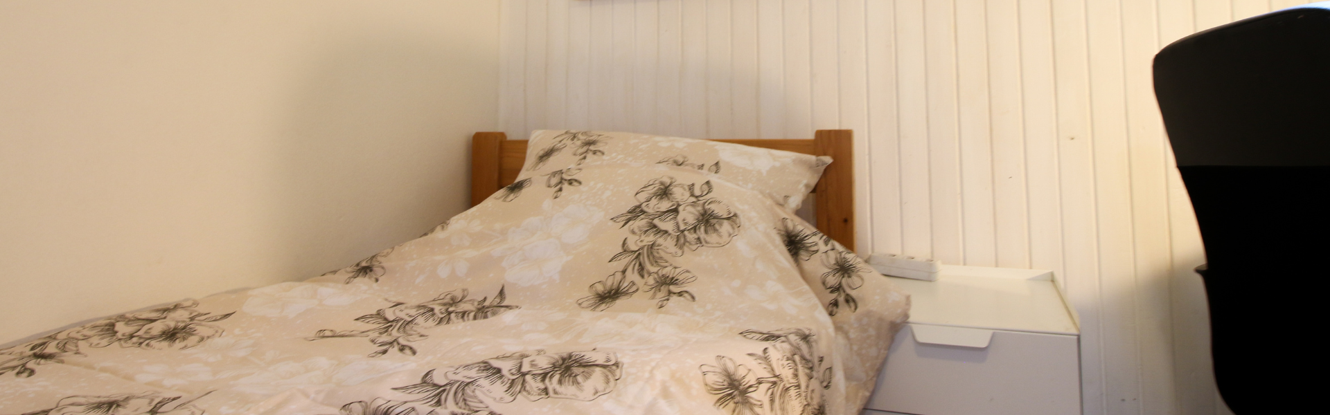 The image shows a bed in Studio Ravnice Two C1.