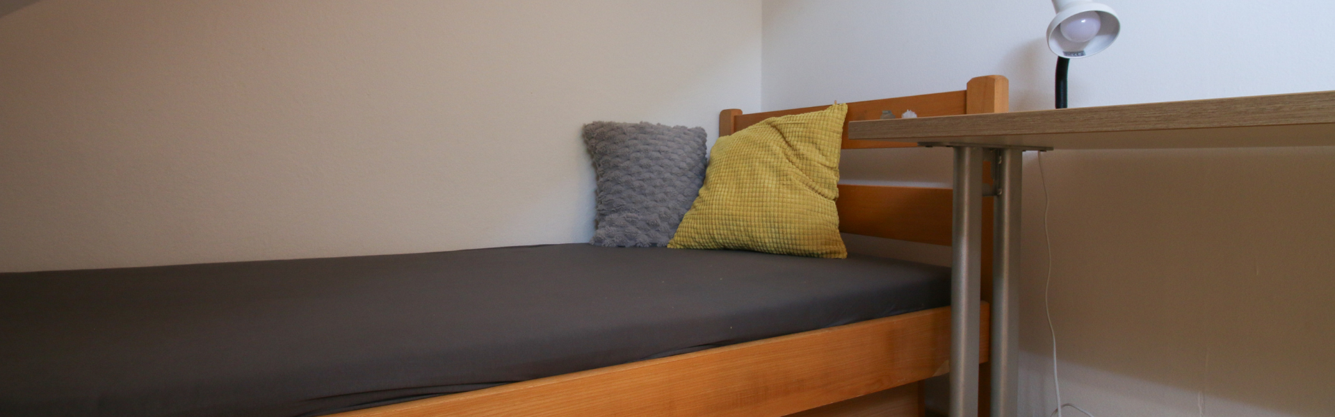 The image shows the bedroom of Room Ravnice Two A5.