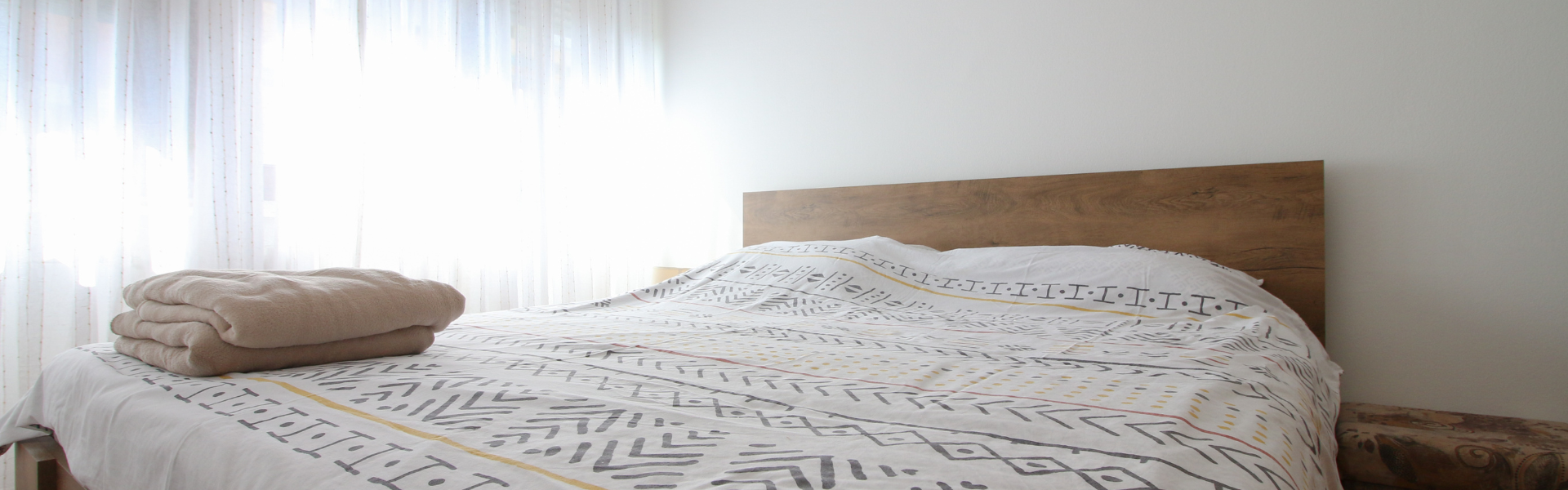 The image shows one of the bedrooms in Apt Savica 2.