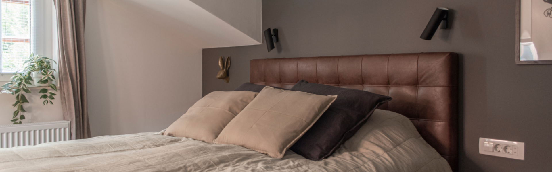 The image shows a bed in Studio Tkalciceva 4.